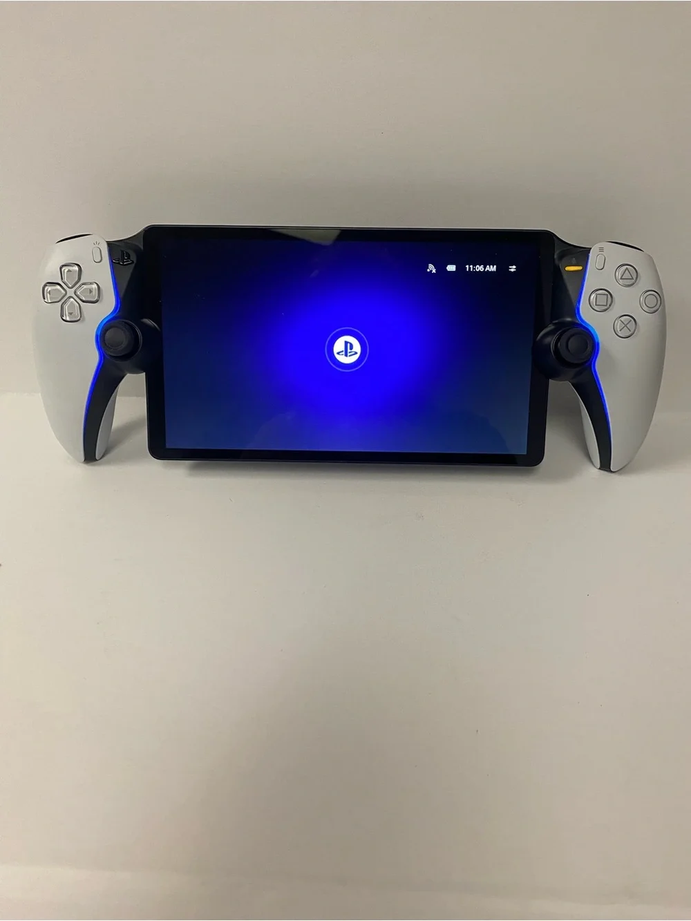 Sony PlayStation Portable-style Handheld with White Side Controllers